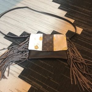 Repurposed LV Fringed clutch